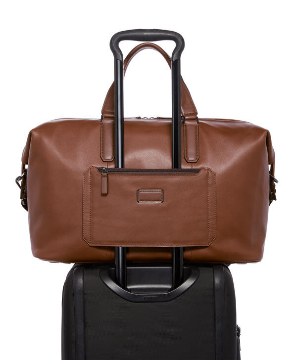 Tumi leather travel bag discount