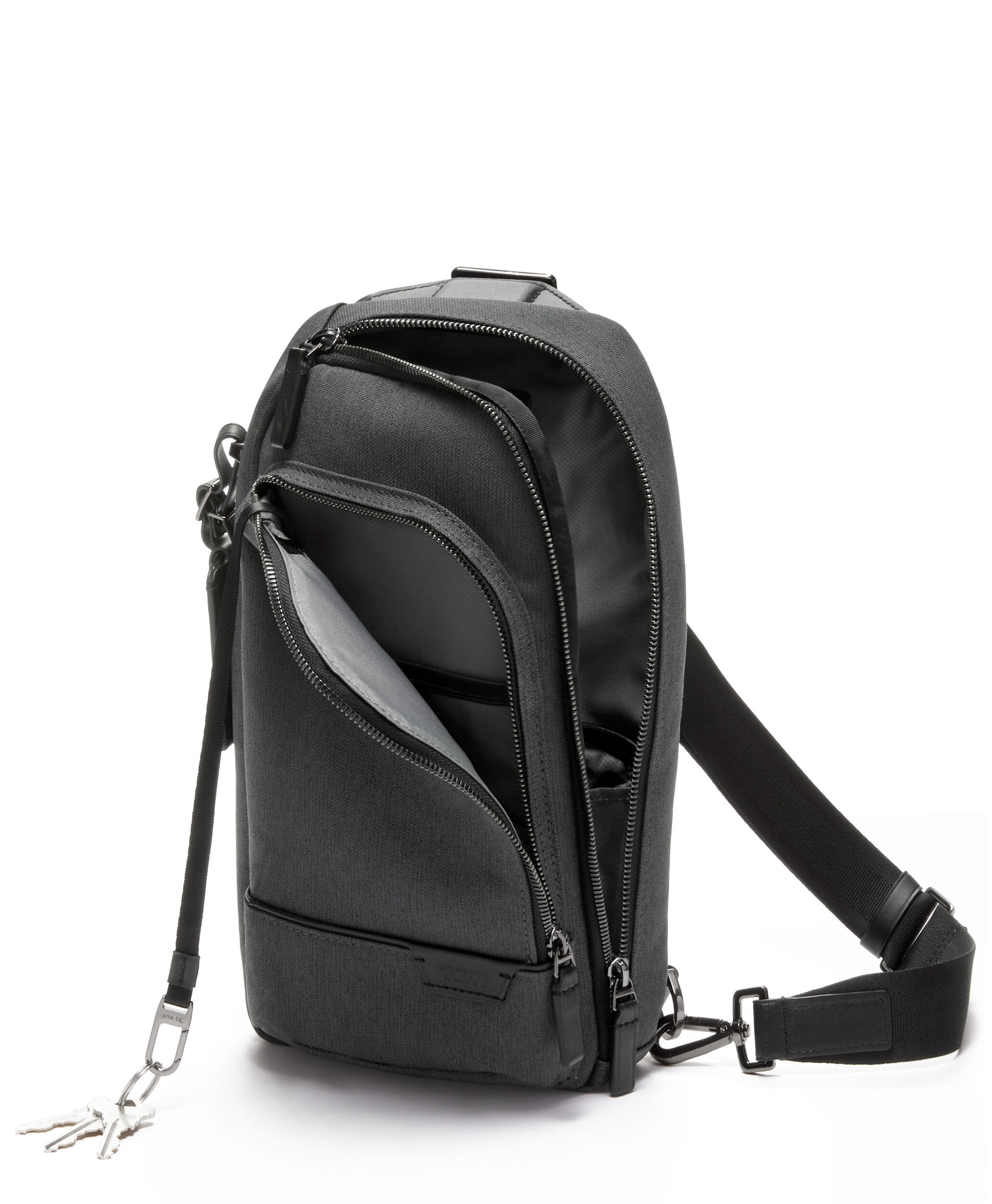 Tumi leather online sling bag