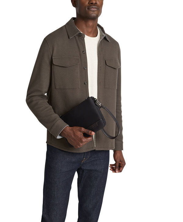 Tumi clutch 2025